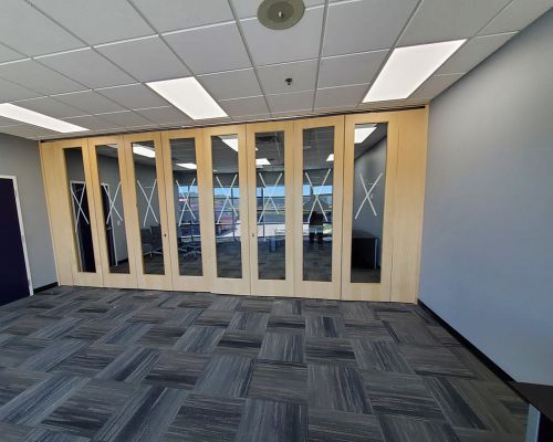 Custom by Folding Partitions on Main Board Room